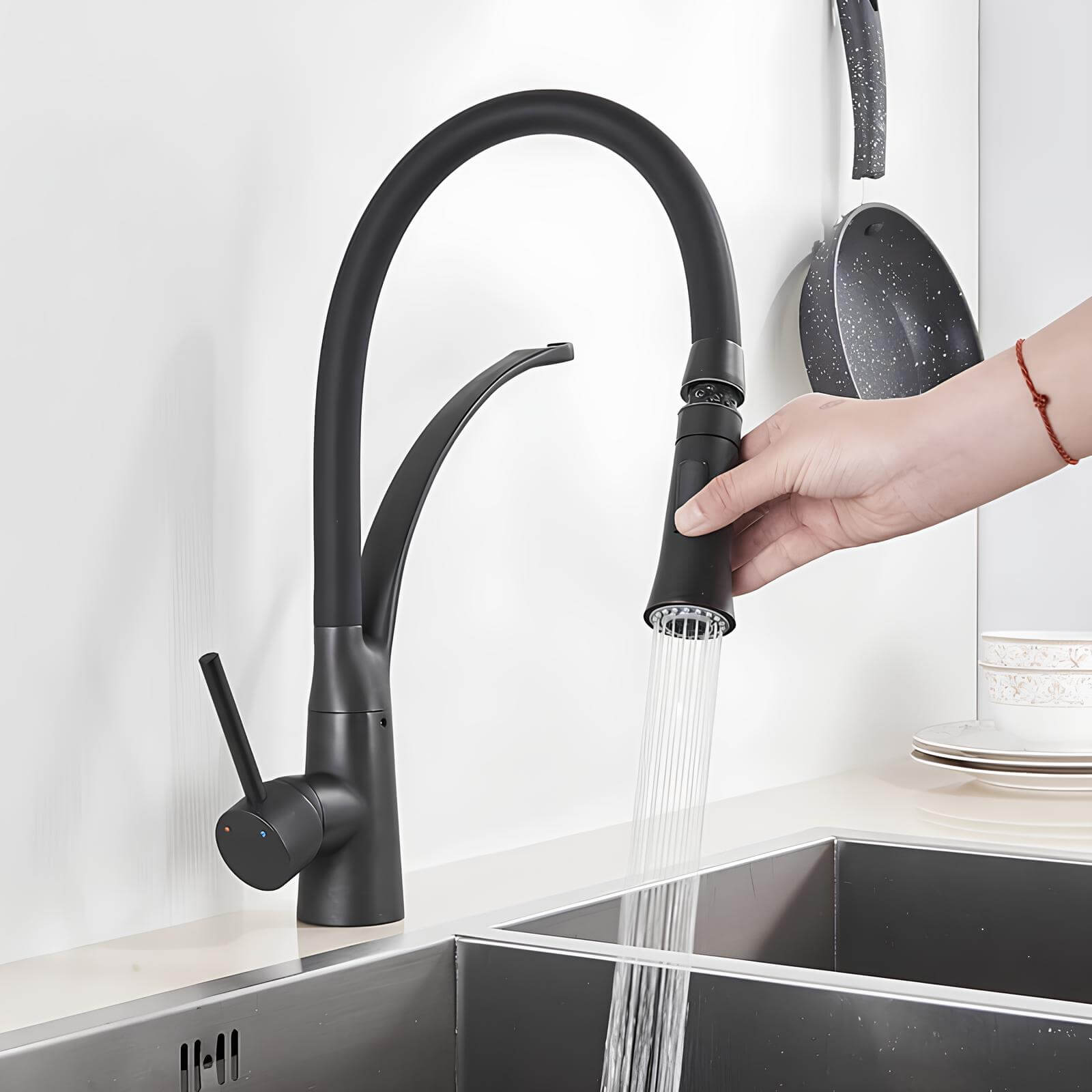 Brass kitchen mixer with pull-down sprayer and 360° swivel spout