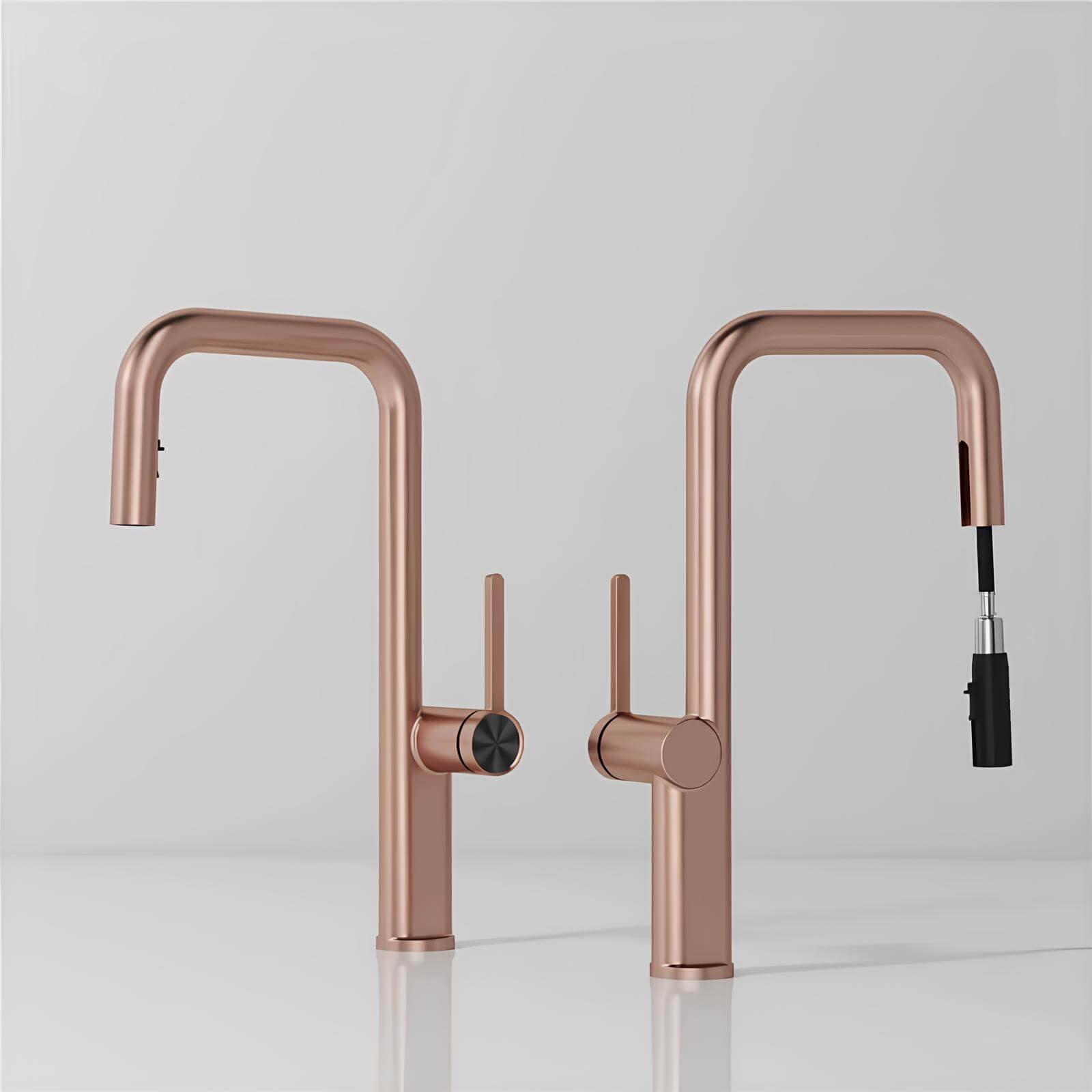 Designer brass kitchen faucet with pull-down sprayer and rotating spout