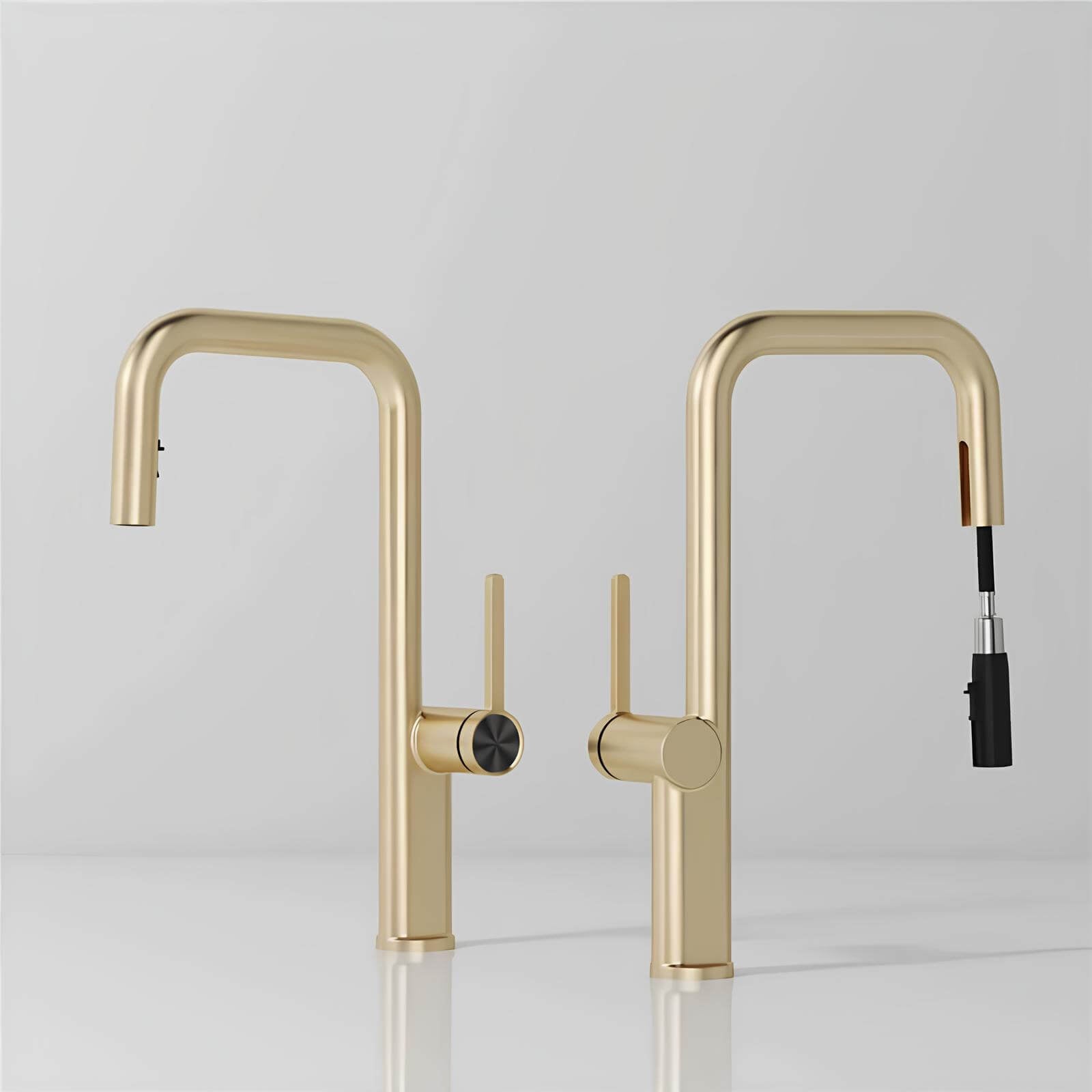 Designer brass kitchen faucet with pull-down sprayer and rotating spout