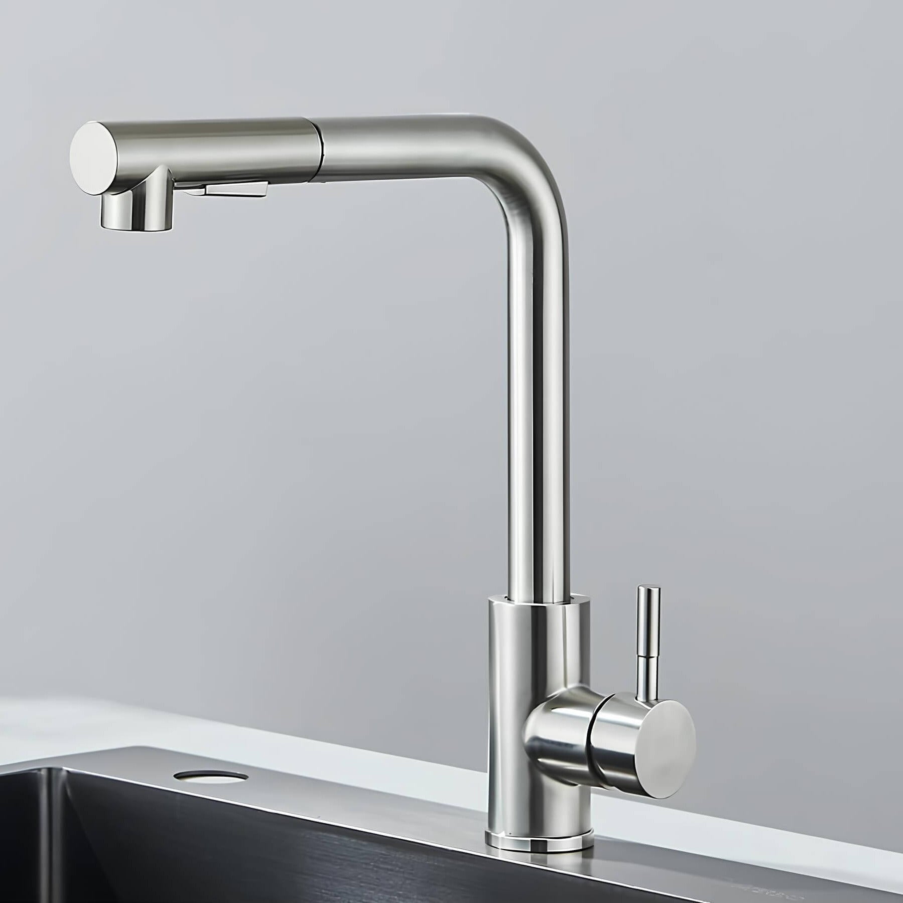 Designer kitchen faucet with dual-spray pull-down head and 360° swivel spout