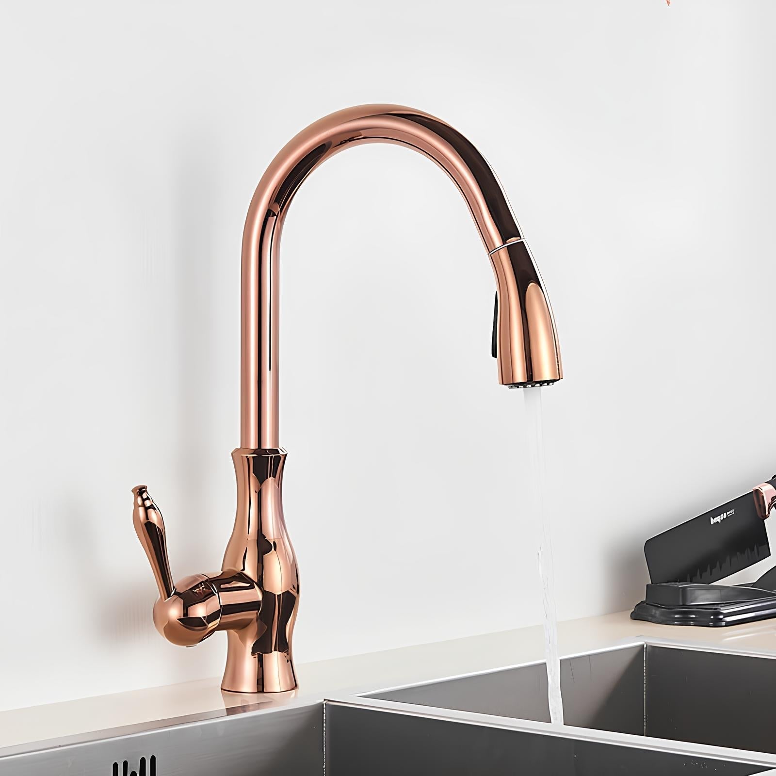 Brass kitchen mixer with hidden retractable sprayer and swivel neck