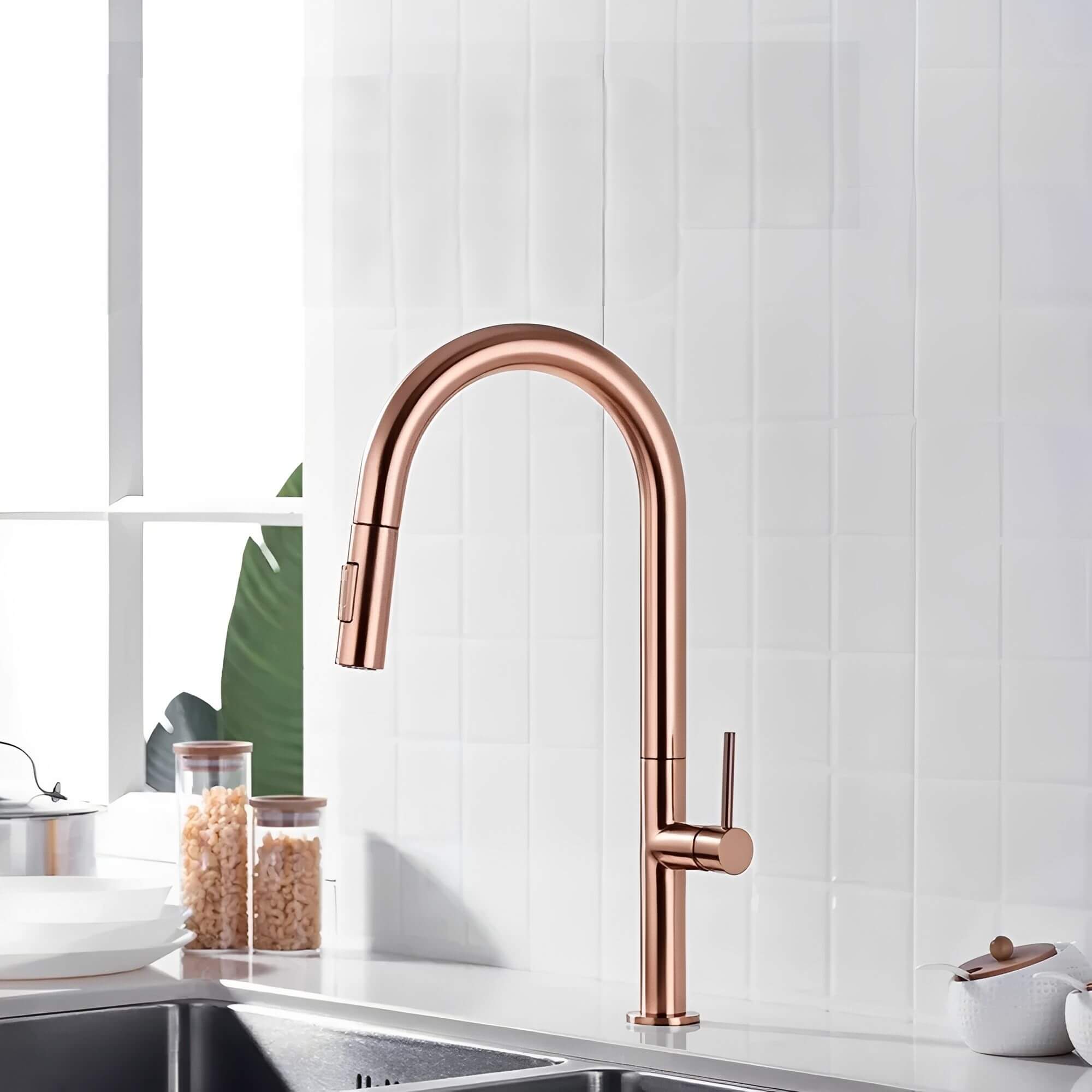Designer kitchen faucet with spring-return pull-down sprayer