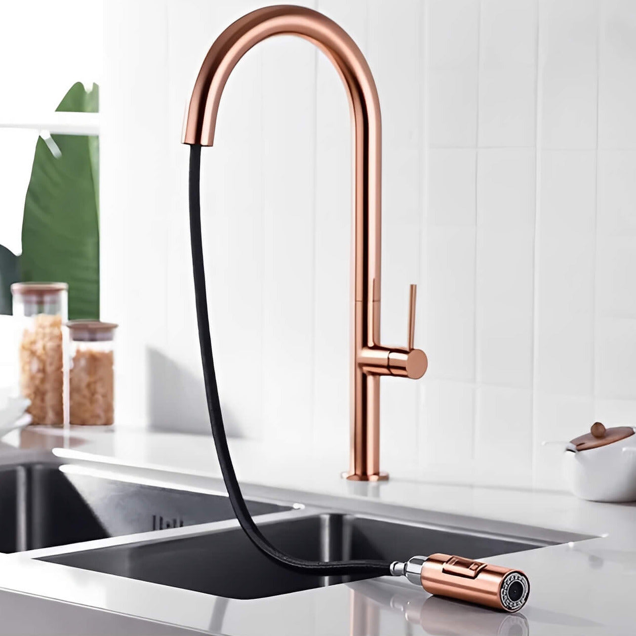 Designer kitchen faucet with spring-return pull-down sprayer