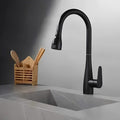 Kitchen faucet with pull-down sprayer and 360° swivel in polished brass