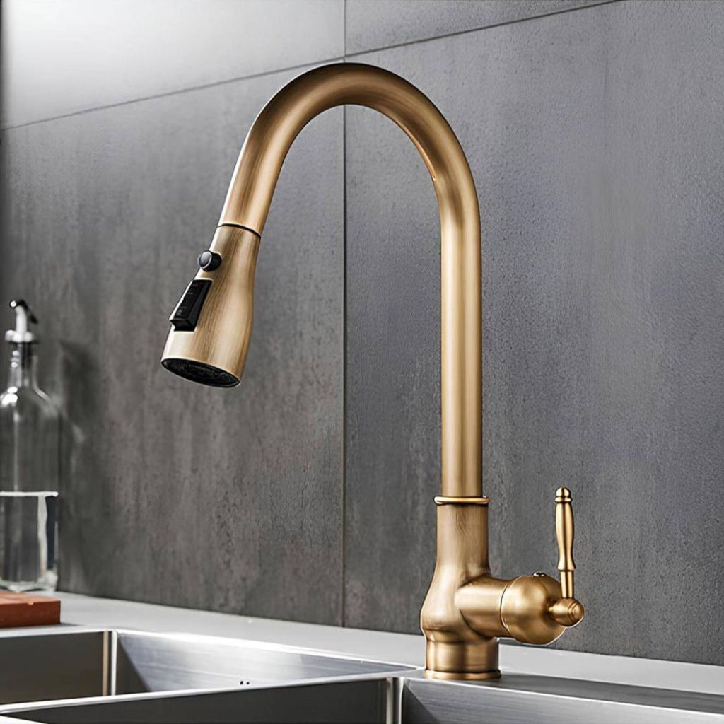Antique brass kitchen faucet with vintage patina and pull-down sprayer