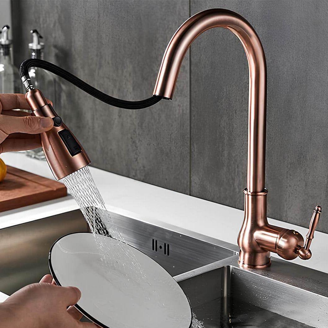 Antique brass kitchen faucet with vintage patina and pull-down sprayer