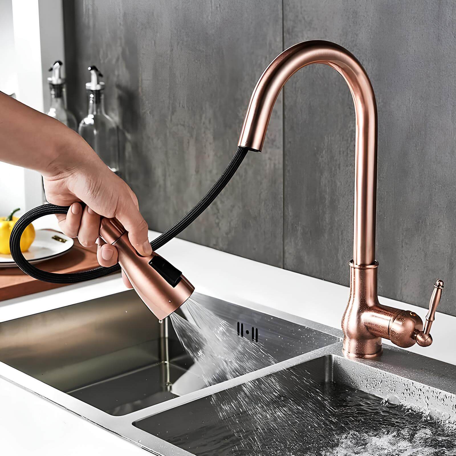 Antique brass kitchen faucet with vintage patina and pull-down sprayer