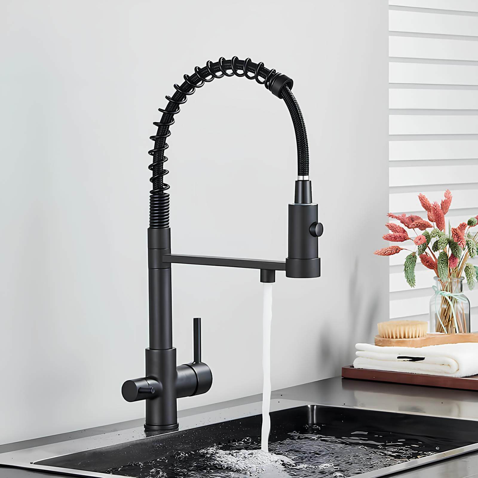 Kitchen faucet with dual handles and dedicated filtered water outlet