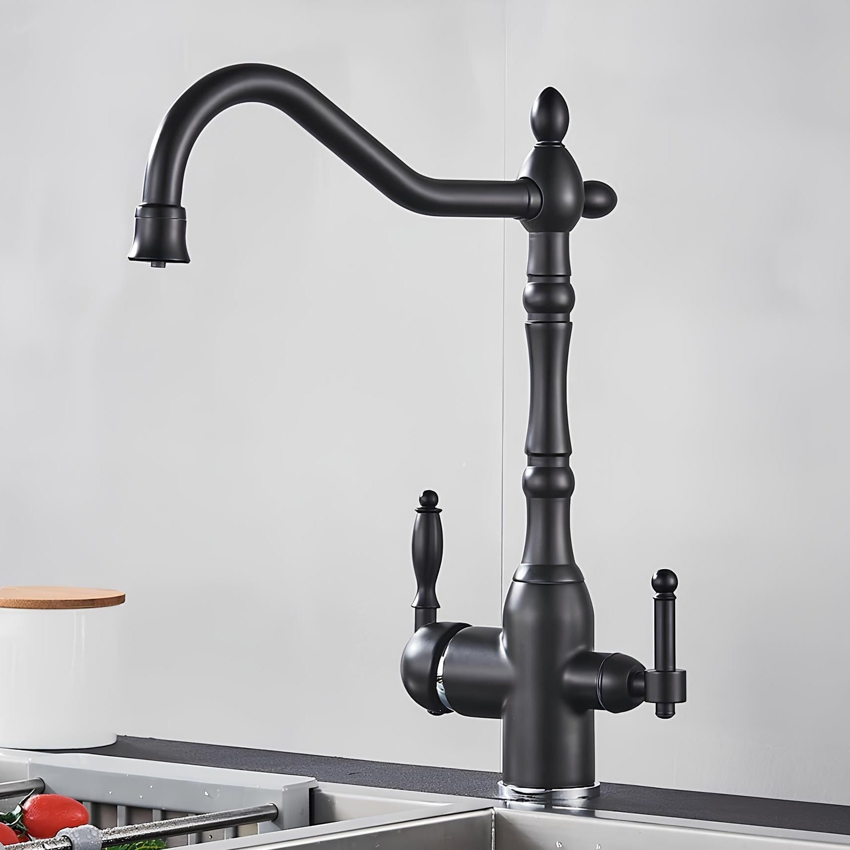 Vintage brass kitchen faucet with dual handles and filtered water outlet