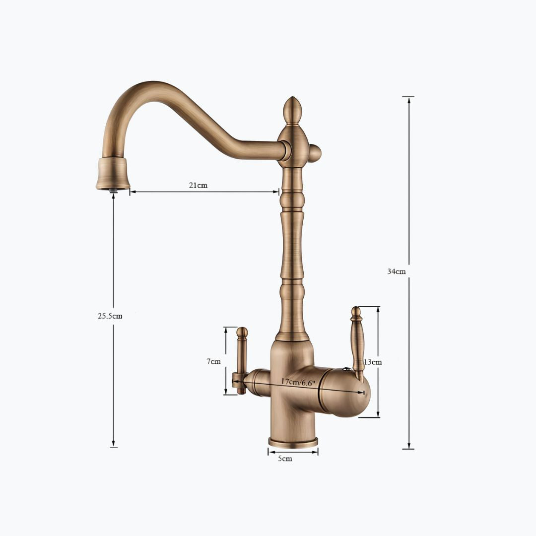 Vintage brass kitchen faucet with dual handles and filtered water outlet