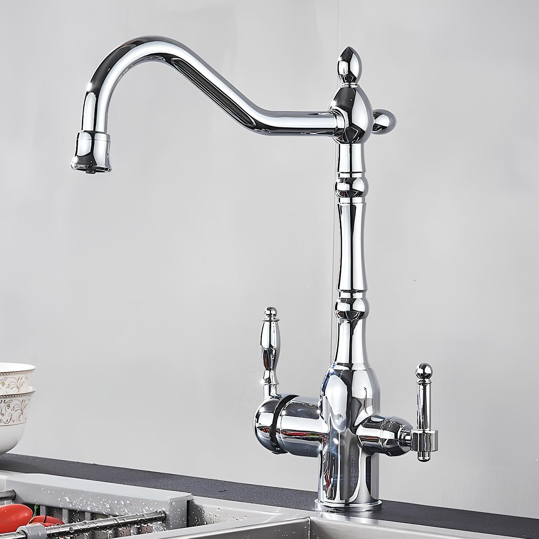 Vintage brass kitchen faucet with dual handles and filtered water outlet