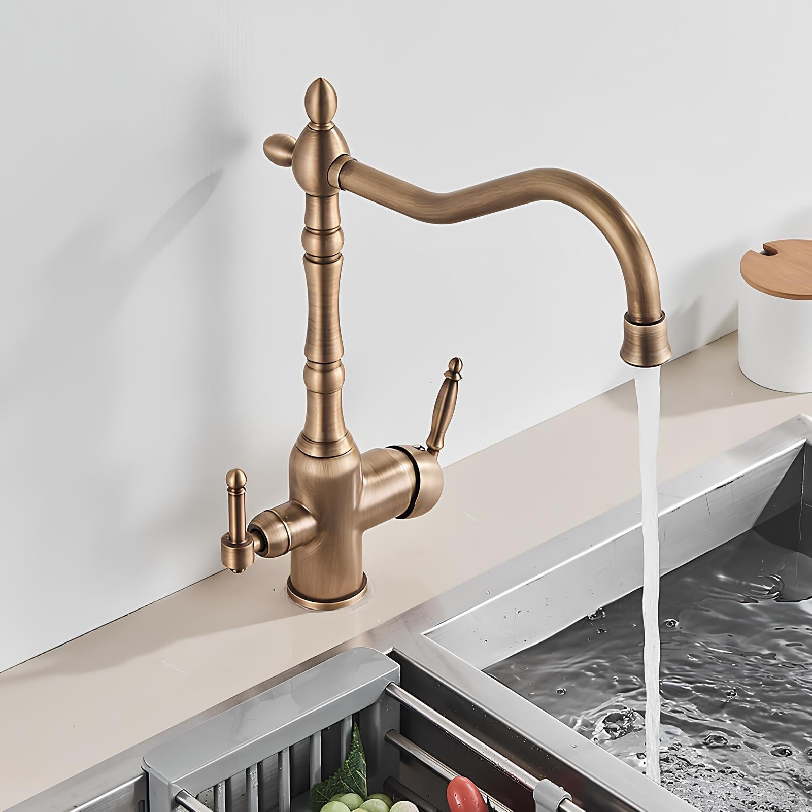 Vintage brass kitchen faucet with dual handles and filtered water outlet