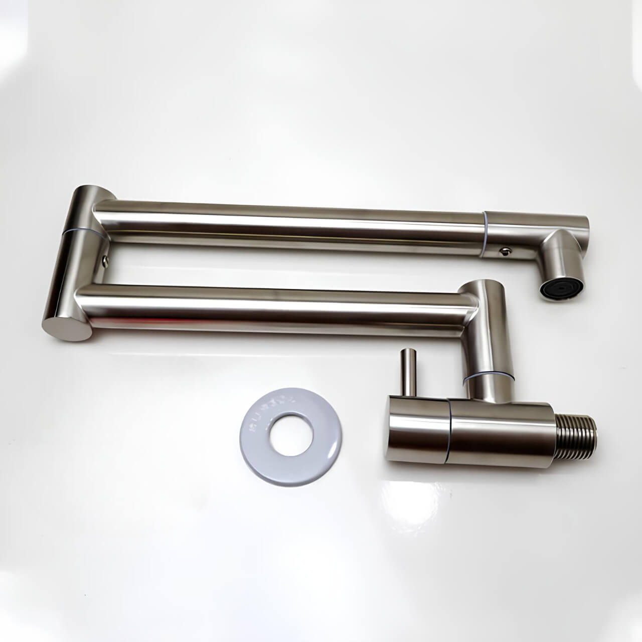 Concealed wall-mount folding kitchen faucet in brushed stainless steel