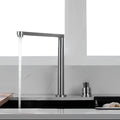 Stainless steel kitchen faucet with integrated filtered water and foldable spout